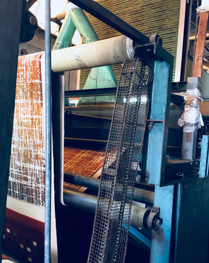 Parte del proceso de fabricación de la alfombra